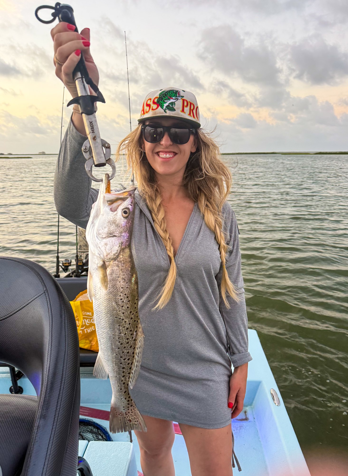 Angler holding a speckled trout near Port O'Connor